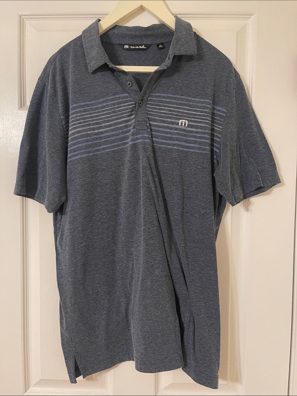 Travis Mathew Heather Navy Polo with Light Blue Stripes